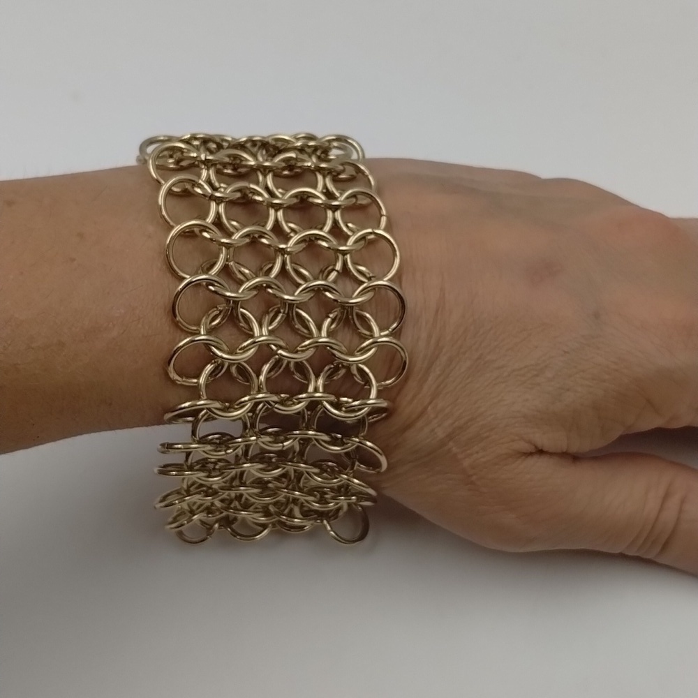 Gold tone round link bracelet cuff
